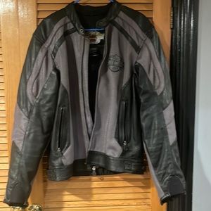 Black and gray Harley Davidson heavy duty nylon and leather riding jacket